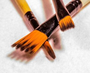 paint brushes with polymer clay props